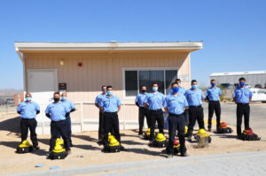 Wildlife Fire Academy students outside in uniform.
