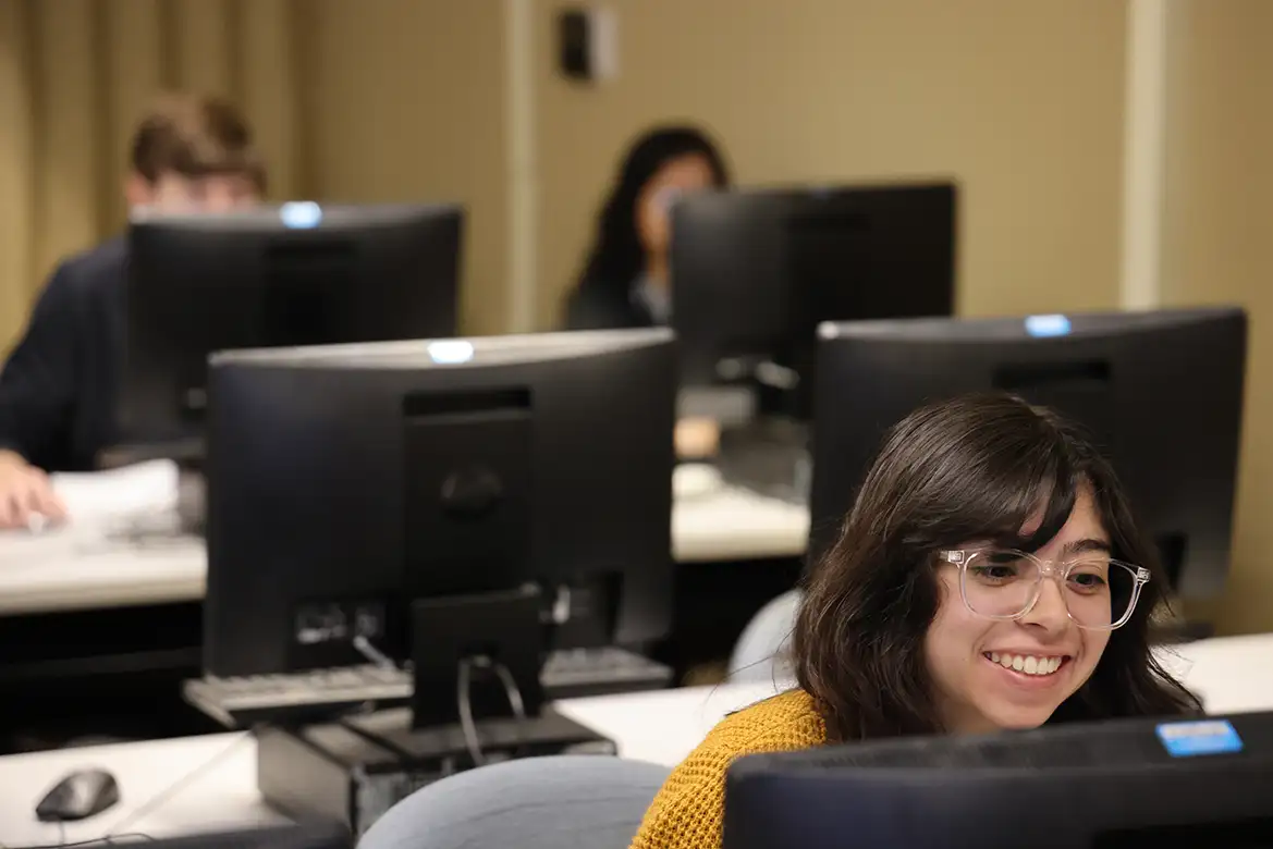 students performing tasks on their desktop computers
