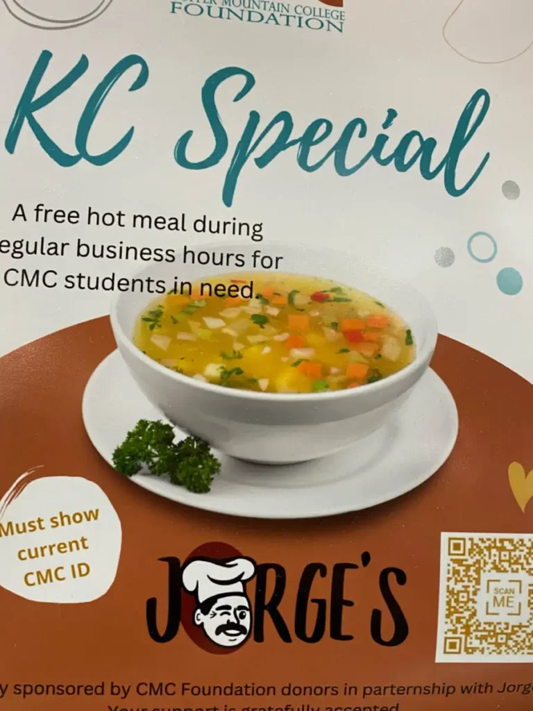 CMC KC Special sign for Jorge's promoting a free hot meal during business hours for students