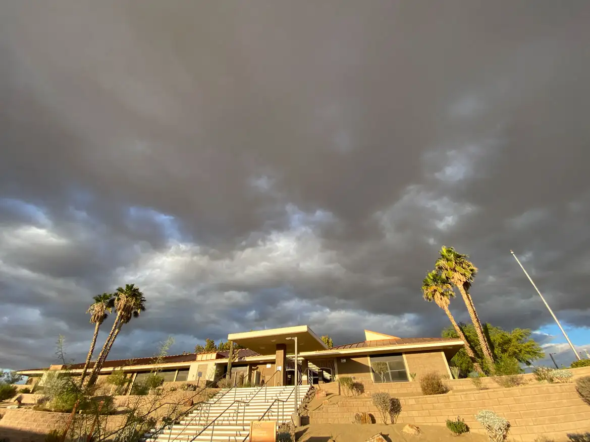 Cloudy skies above campus building