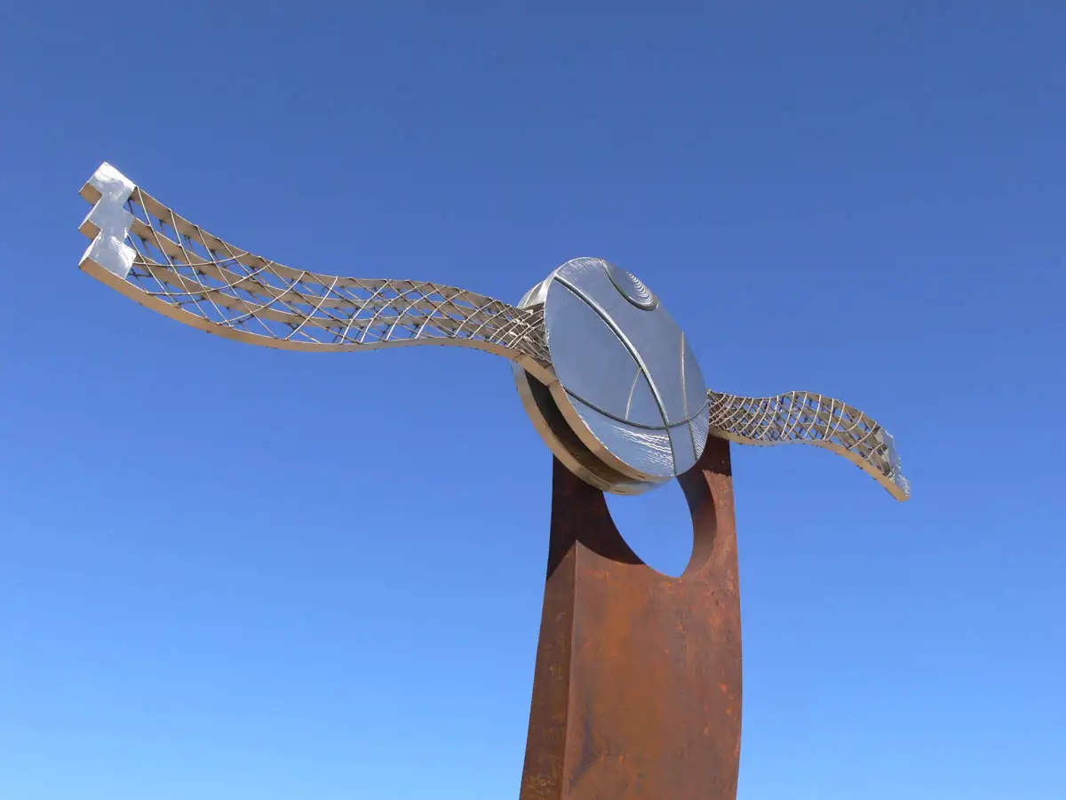 cool metal windmill like statue