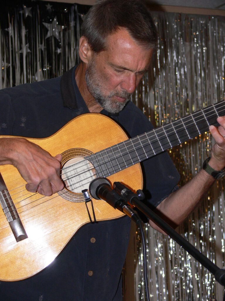 Photo of songwriter, musician, and flamenco guitarist, Tommy Paul.