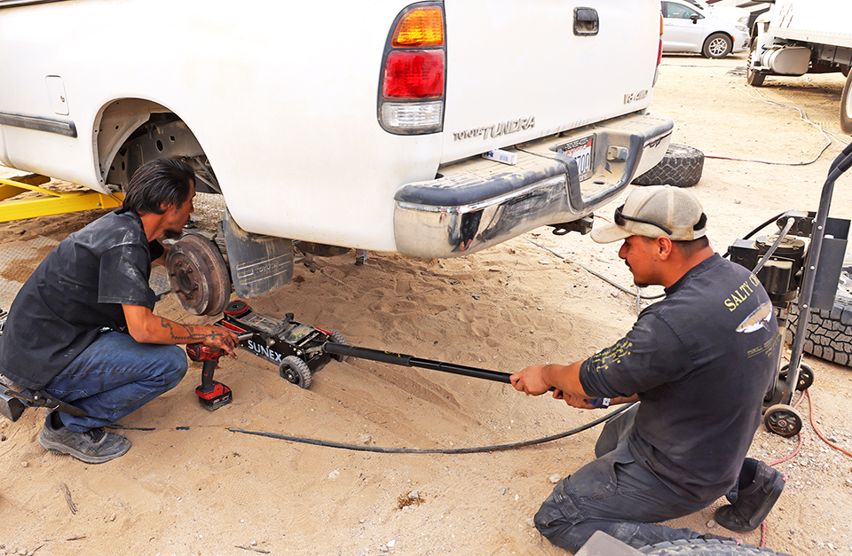 CMC Auto Tech students work on vehicles at King of the Hammers 2026