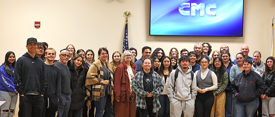 Group photo of Criminal Justice Club and CMC guests with Lieutenant Gil Carillo at his Night Stalker presentation.